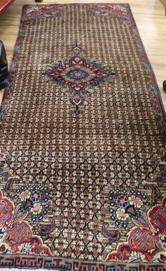 A Hamadan green ground runner, 9ft 4in x 4ft.